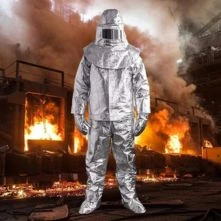Clothing Made Of Limited Flame Spread Materials And Material Assemblies Affording Protection Against Heat And Flame